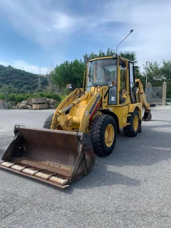 2005 KOMATSU WB70A