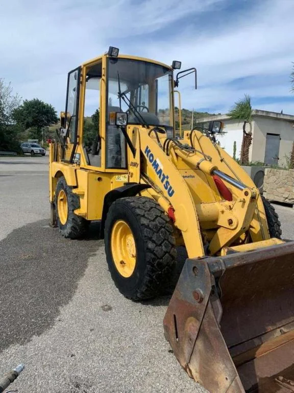 2005 KOMATSU WB70A